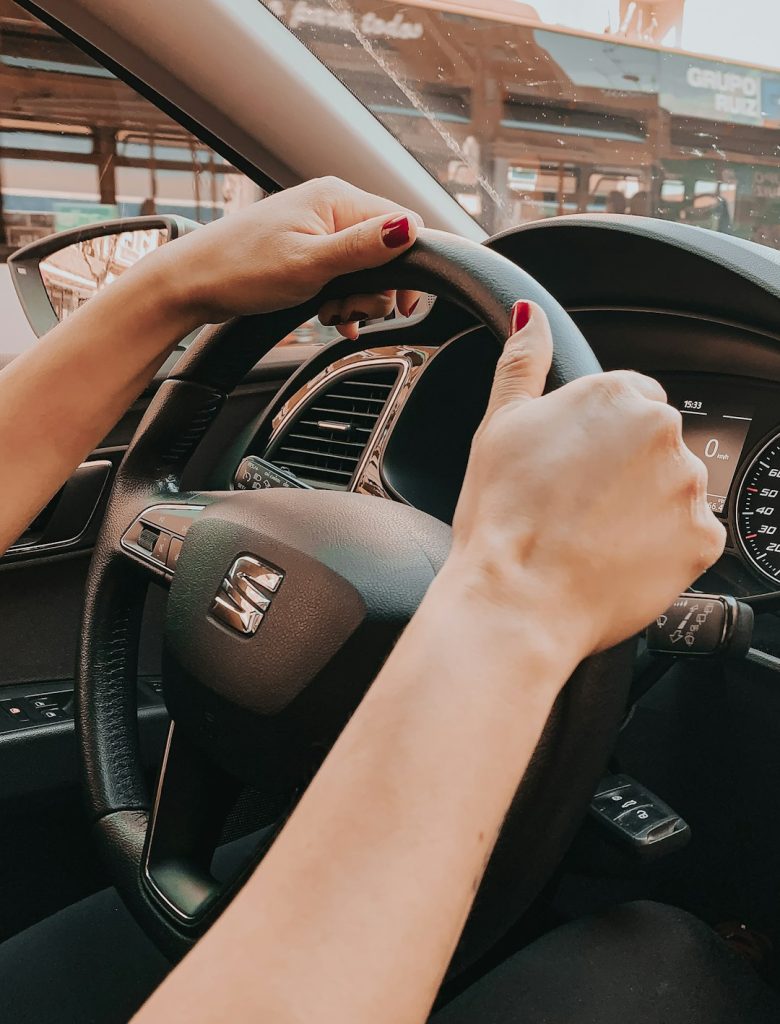 person-holding-black-honda-steering-wheel-nvaxs1nipfq
