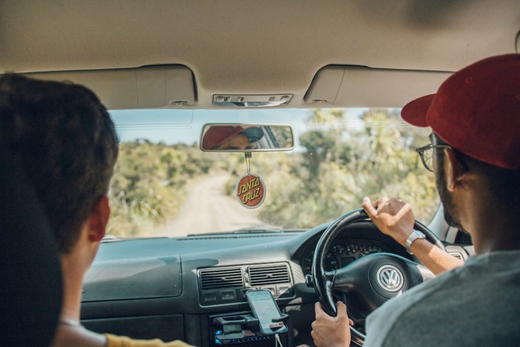 two-men-inside-car-suz9-m9bwoe